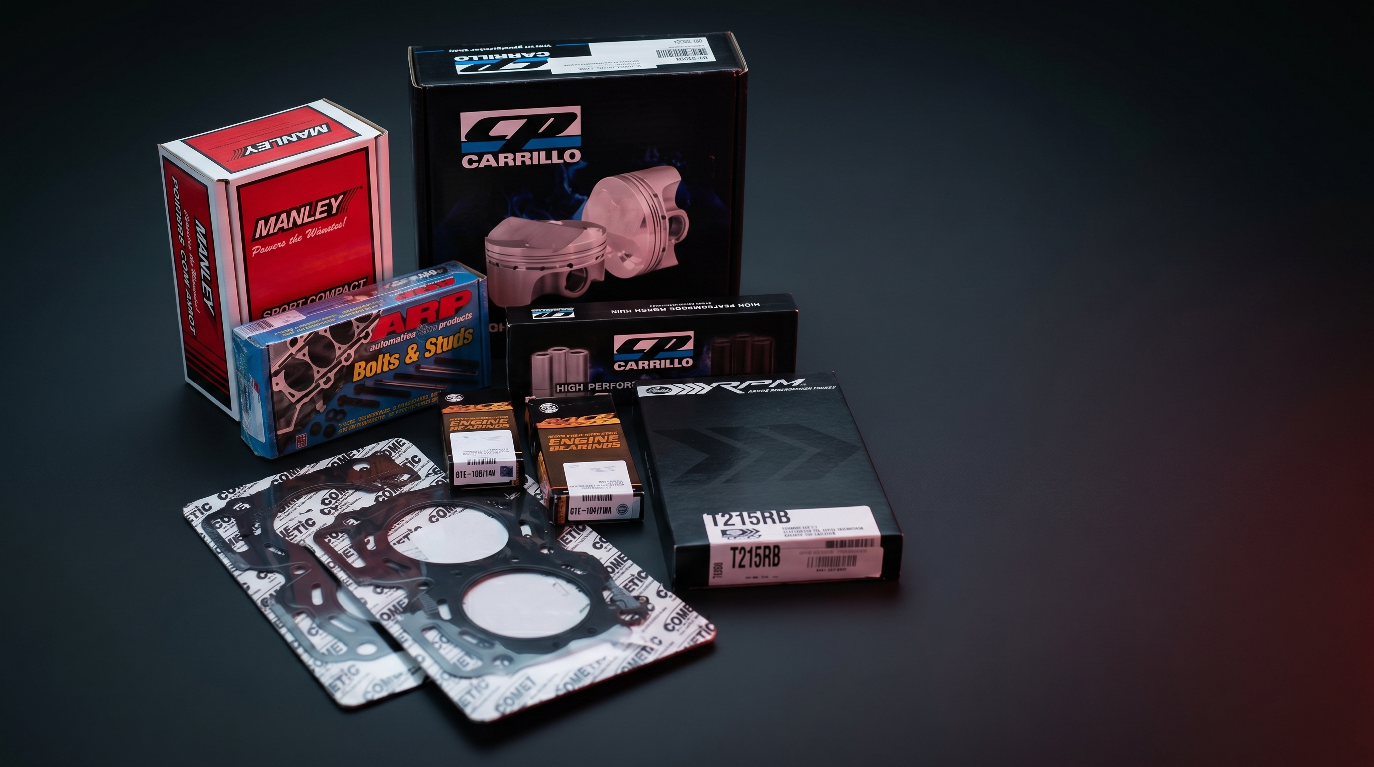 Forged engine rebuild package on a dark workshop surface